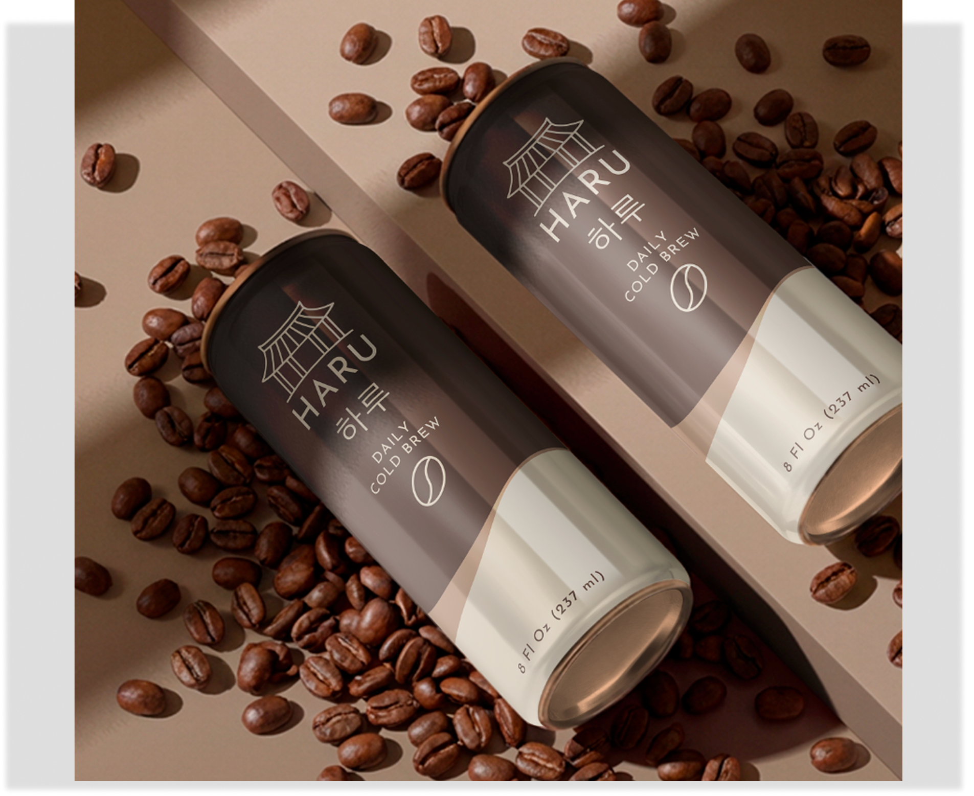 Haru cold brew coffee cans with a dark label, cream base and coffee beans.